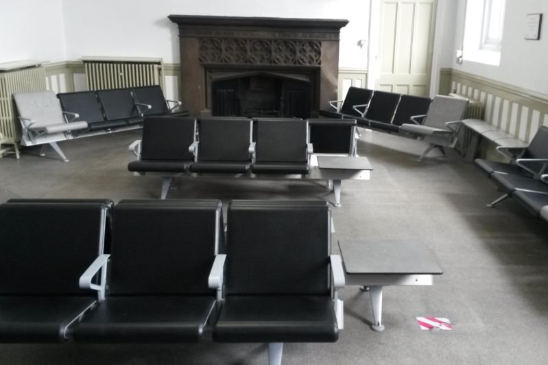 Carlisle station's waiting room, which still has a fireplace, has filled the room with plenty of seats and adjacent tables. Often the tables, ideal for placing a cup of coffee, are forgotten