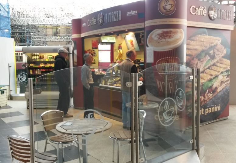 Carlisle station has several places where refreshments can be purchased. This coffee kiosk has seats and tables with glass to minimise the noise from people passing by