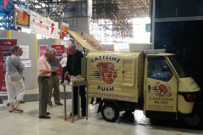 It can be uneconomical to have many refreshment kiosks inside a station because of the lack of business all day long. A mobile van serving coffee on the platform may be the solution for many stations