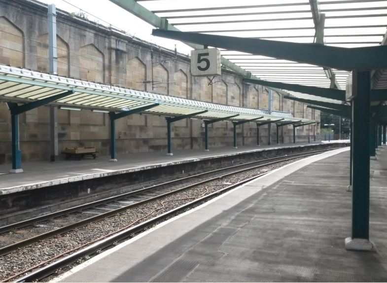 Many stations have minimal protection from the weather. Where canopies exist they are usually just at one end of a platform which is a false economy as dwell times become longer as many passengers board and alight from just a few carriages. Carlisle station has canopies stretching along much of the platforms adjacent to most (and often all) of the carriages