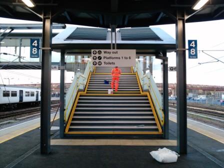 024-workman-on-the-stairs